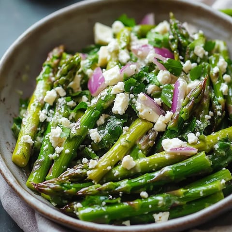 A bowl of vegetables with feta cheese.