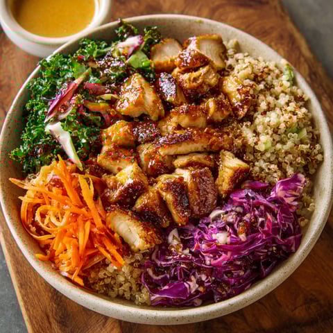 A delicious Hot Honey Chicken Bowl with a variety of vegetables and rice.