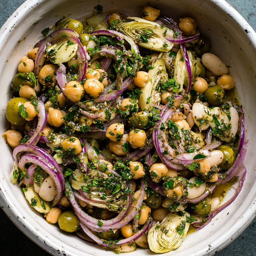 A bowl filled with a delicious marinated za'atar bean salad.