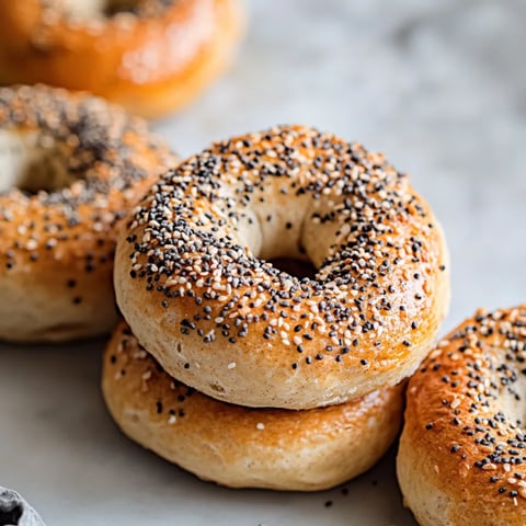 A stack of poppy seed bagels.