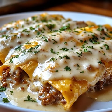 Southern Breakfast Enchiladas with Sausage Gravy