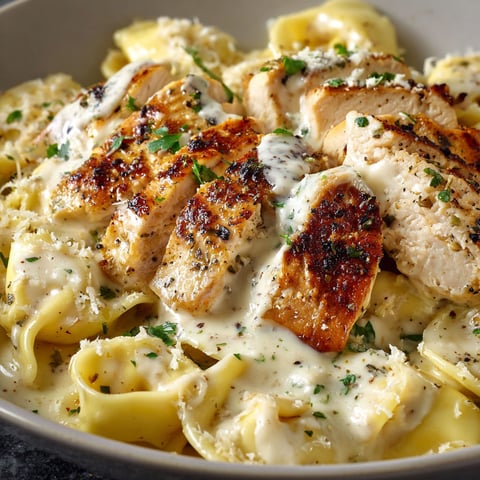 A delicious meal of Asiago Tortelloni Alfredo Chicken.